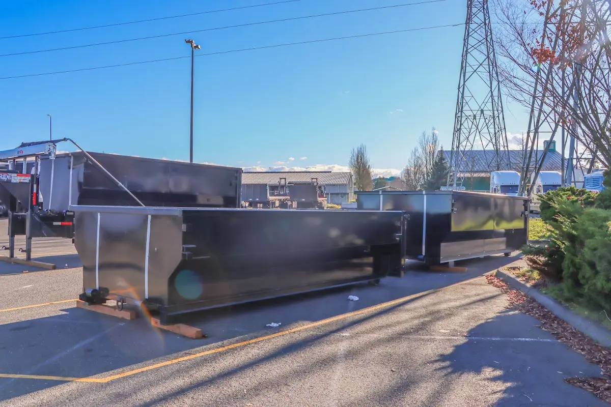 Roll-off dumpster ready for waste disposal at job site for 2 Yard Dumpster Rental in Pittston
